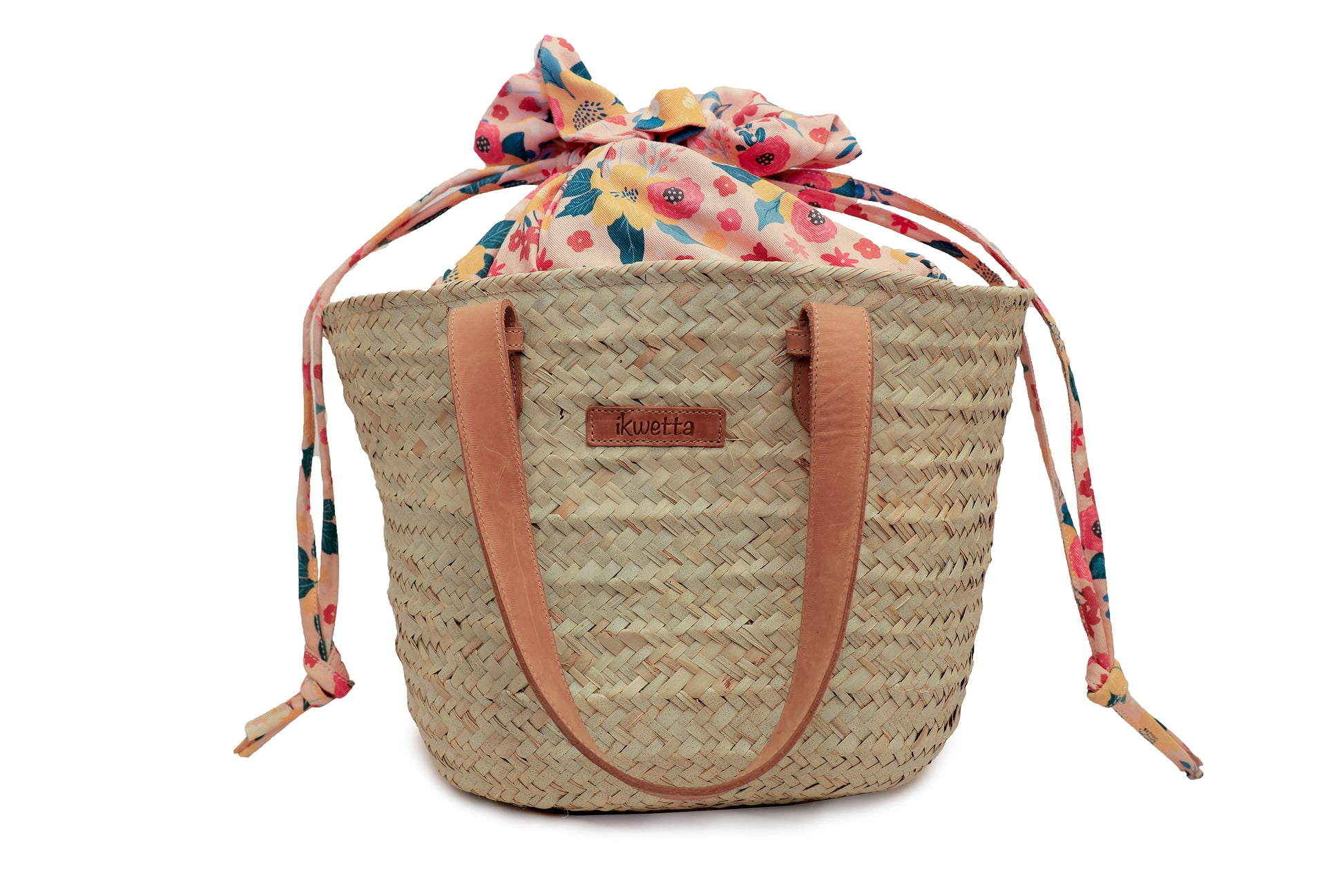 Kapu basket handcrafted with sisal, leather handles and canvas