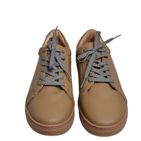 I am Kenyan sneaker in tan/honey milled leather and royal sole