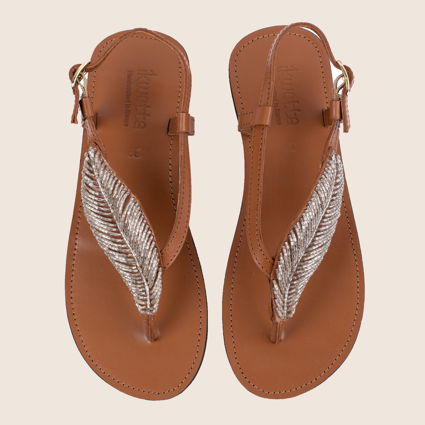 Tropical luxe sandals in Caramel smooth leather with a leaf style beaded strap.