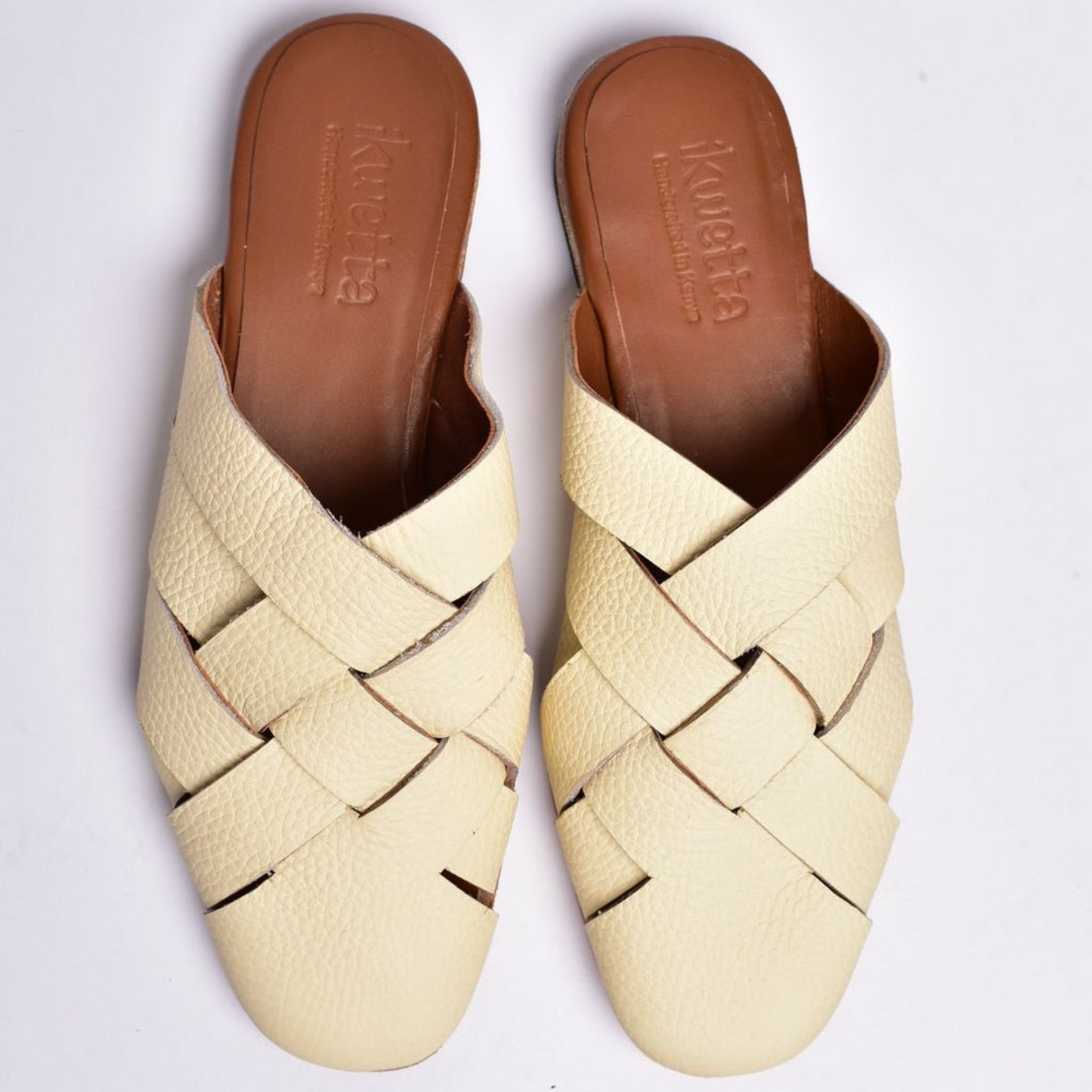 Roman mules in vanilla milled leather