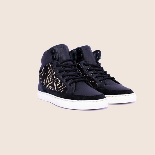 Hightop mudcloth sneaker in Black milled leather, mudcloth material and royal soles