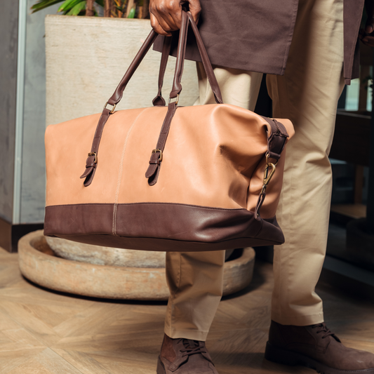 Carryall dufflel travelling bag in tan and brown leather