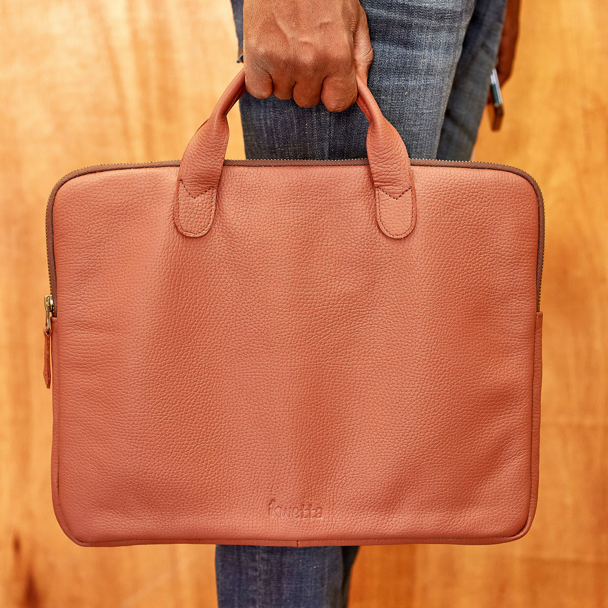 Made in Kenya leather laptop bag in firedbrick naturel dried milled leather.