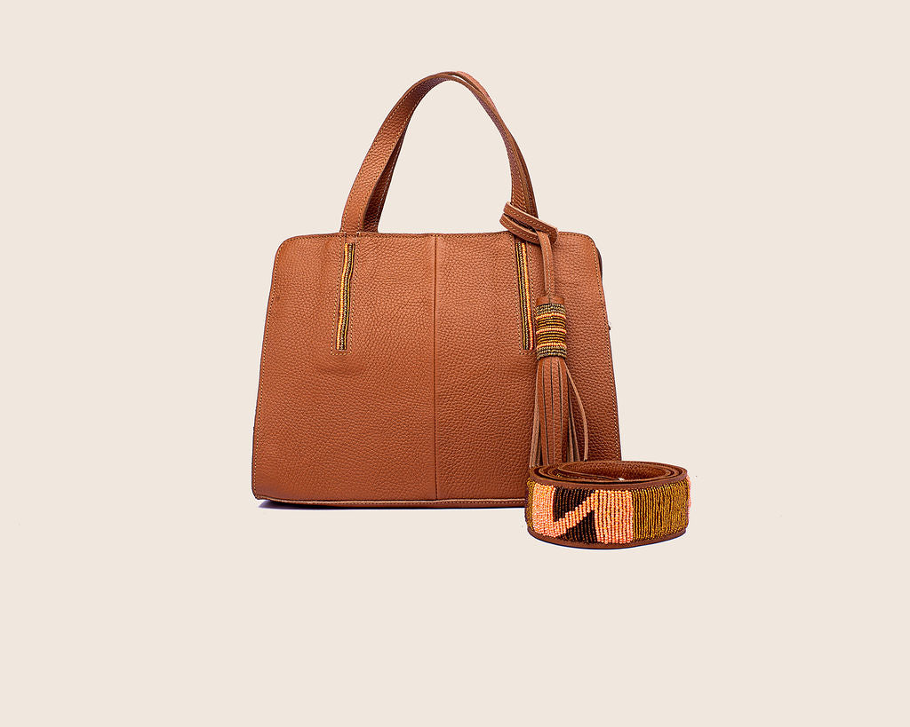 Kate bag in Sugar almond milled leather and with Maasai beaded strap.