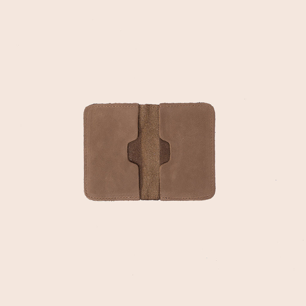 https://admin.shopify.com/store/iikwetta/products/7640001577114#:~:text=Wapi%20card%20holder%20handcrafted%20with%20suede%20leather